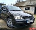Черный Опель Астра, объемом двигателя 1.4 л и пробегом 250 тыс. км за 3999 $, фото 1 на Automoto.ua
