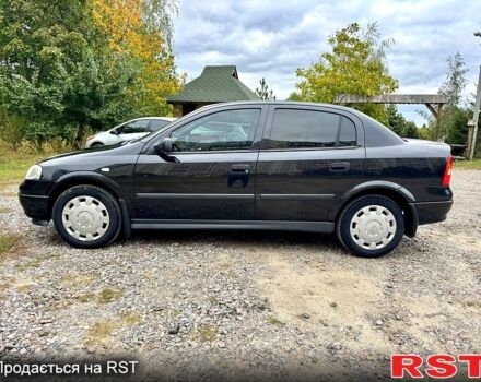 Черный Опель Астра, объемом двигателя 1.4 л и пробегом 176 тыс. км за 4390 $, фото 2 на Automoto.ua