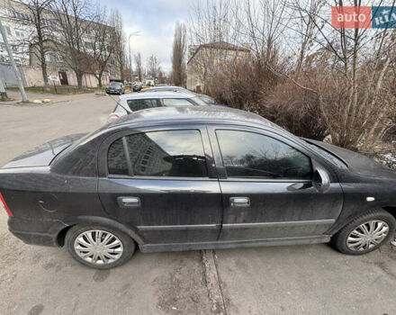Черный Опель Астра, объемом двигателя 1.4 л и пробегом 225 тыс. км за 2799 $, фото 2 на Automoto.ua