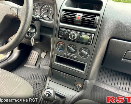 Черный Опель Астра, объемом двигателя 1.4 л и пробегом 176 тыс. км за 4390 $, фото 8 на Automoto.ua