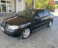 Черный Опель Астра, объемом двигателя 1.4 л и пробегом 107 тыс. км за 4800 $, фото 11 на Automoto.ua