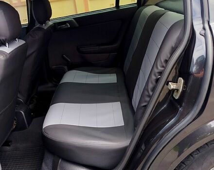 Черный Опель Астра, объемом двигателя 1.6 л и пробегом 217 тыс. км за 4100 $, фото 6 на Automoto.ua