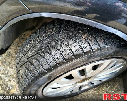 Черный Опель Астра, объемом двигателя 1.4 л и пробегом 250 тыс. км за 3999 $, фото 7 на Automoto.ua