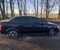 Черный Опель Астра, объемом двигателя 1.4 л и пробегом 219 тыс. км за 3400 $, фото 10 на Automoto.ua