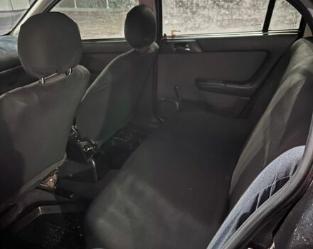 Черный Опель Астра, объемом двигателя 1.4 л и пробегом 338 тыс. км за 2300 $, фото 7 на Automoto.ua