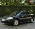 Черный Опель Астра, объемом двигателя 1.6 л и пробегом 170 тыс. км за 4300 $, фото 1 на Automoto.ua