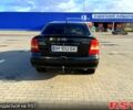 Черный Опель Астра, объемом двигателя 1.4 л и пробегом 176 тыс. км за 4000 $, фото 2 на Automoto.ua