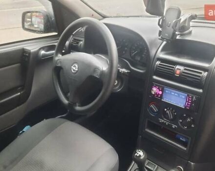 Черный Опель Астра, объемом двигателя 1.6 л и пробегом 277 тыс. км за 3400 $, фото 11 на Automoto.ua