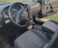 Черный Опель Астра, объемом двигателя 1.4 л и пробегом 140 тыс. км за 3300 $, фото 5 на Automoto.ua