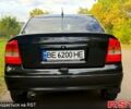 Черный Опель Астра, объемом двигателя 1.4 л и пробегом 250 тыс. км за 4000 $, фото 3 на Automoto.ua