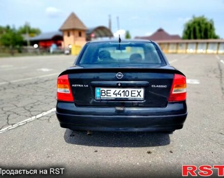 Черный Опель Астра, объемом двигателя 1.4 л и пробегом 320 тыс. км за 3300 $, фото 2 на Automoto.ua