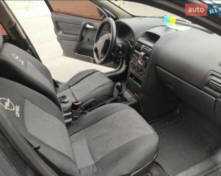 Черный Опель Астра, объемом двигателя 1.39 л и пробегом 231 тыс. км за 4200 $, фото 6 на Automoto.ua