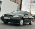 Черный Опель Астра, объемом двигателя 1.4 л и пробегом 216 тыс. км за 3999 $, фото 13 на Automoto.ua