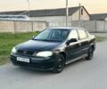 Черный Опель Астра, объемом двигателя 1.6 л и пробегом 166 тыс. км за 2000 $, фото 1 на Automoto.ua
