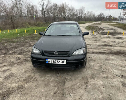 Черный Опель Астра, объемом двигателя 1.7 л и пробегом 300 тыс. км за 2999 $, фото 1 на Automoto.ua