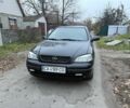 Черный Опель Астра, объемом двигателя 1.6 л и пробегом 250 тыс. км за 3750 $, фото 12 на Automoto.ua