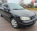 Чорний Опель Астра, об'ємом двигуна 1.4 л та пробігом 225 тис. км за 4350 $, фото 1 на Automoto.ua