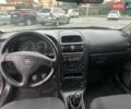 Черный Опель Астра, объемом двигателя 1.4 л и пробегом 216 тыс. км за 3999 $, фото 14 на Automoto.ua