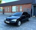 Черный Опель Астра, объемом двигателя 1.4 л и пробегом 250 тыс. км за 3450 $, фото 1 на Automoto.ua