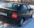 Черный Опель Астра, объемом двигателя 1.39 л и пробегом 145 тыс. км за 4000 $, фото 15 на Automoto.ua