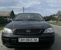 Черный Опель Астра, объемом двигателя 1.6 л и пробегом 283 тыс. км за 2905 $, фото 2 на Automoto.ua