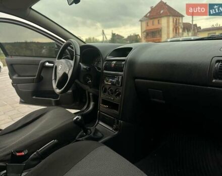 Черный Опель Астра, объемом двигателя 1.4 л и пробегом 216 тыс. км за 3999 $, фото 25 на Automoto.ua