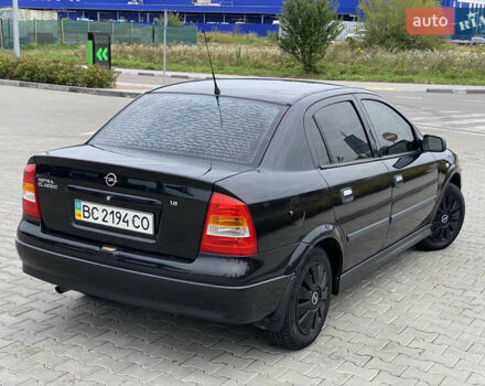 Черный Опель Астра, объемом двигателя 1.6 л и пробегом 144 тыс. км за 4200 $, фото 2 на Automoto.ua