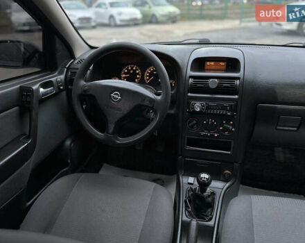 Черный Опель Астра, объемом двигателя 1.4 л и пробегом 102 тыс. км за 3600 $, фото 24 на Automoto.ua