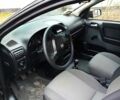 Черный Опель Астра, объемом двигателя 1.4 л и пробегом 155 тыс. км за 3500 $, фото 4 на Automoto.ua