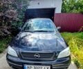 Черный Опель Астра, объемом двигателя 1.6 л и пробегом 128 тыс. км за 5100 $, фото 1 на Automoto.ua