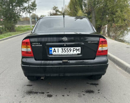 Черный Опель Астра, объемом двигателя 1.36 л и пробегом 193 тыс. км за 3700 $, фото 5 на Automoto.ua