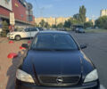 Черный Опель Астра, объемом двигателя 1.6 л и пробегом 300 тыс. км за 3500 $, фото 1 на Automoto.ua