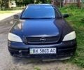 Черный Опель Астра, объемом двигателя 1.4 л и пробегом 300 тыс. км за 1300 $, фото 1 на Automoto.ua