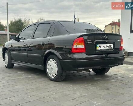 Черный Опель Астра, объемом двигателя 1.4 л и пробегом 216 тыс. км за 3999 $, фото 10 на Automoto.ua