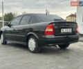 Черный Опель Астра, объемом двигателя 1.4 л и пробегом 216 тыс. км за 3999 $, фото 10 на Automoto.ua