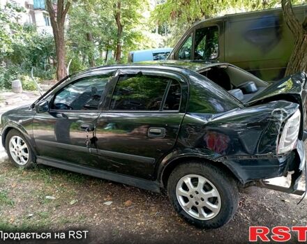 Черный Опель Астра, объемом двигателя 1.6 л и пробегом 170 тыс. км за 1300 $, фото 7 на Automoto.ua