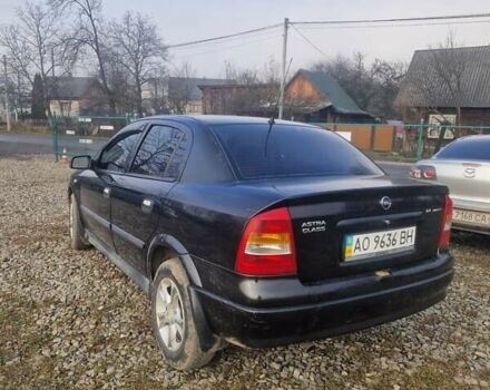 Черный Опель Астра, объемом двигателя 1.39 л и пробегом 180 тыс. км за 2550 $, фото 2 на Automoto.ua