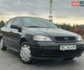 Черный Опель Астра, объемом двигателя 1.4 л и пробегом 216 тыс. км за 3999 $, фото 3 на Automoto.ua