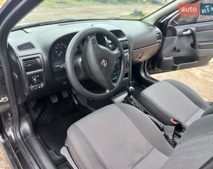 Черный Опель Астра, объемом двигателя 1.4 л и пробегом 230 тыс. км за 4500 $, фото 13 на Automoto.ua