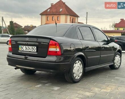 Черный Опель Астра, объемом двигателя 1.4 л и пробегом 216 тыс. км за 3999 $, фото 7 на Automoto.ua