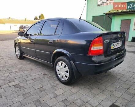 Черный Опель Астра, объемом двигателя 1.6 л и пробегом 100 тыс. км за 2800 $, фото 2 на Automoto.ua