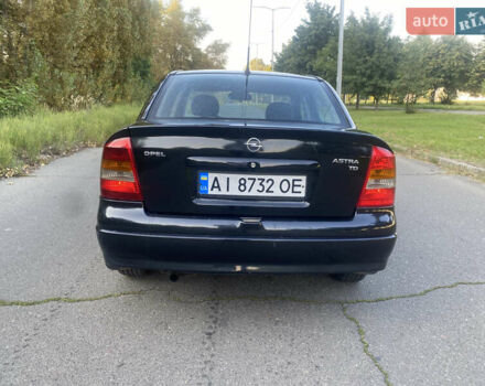 Черный Опель Астра, объемом двигателя 1.7 л и пробегом 300 тыс. км за 2400 $, фото 5 на Automoto.ua