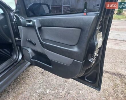 Черный Опель Астра, объемом двигателя 1.4 л и пробегом 230 тыс. км за 4500 $, фото 18 на Automoto.ua