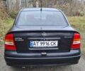 Черный Опель Астра, объемом двигателя 1.4 л и пробегом 180 тыс. км за 3800 $, фото 2 на Automoto.ua
