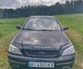 Черный Опель Астра, объемом двигателя 1.6 л и пробегом 230 тыс. км за 3300 $, фото 1 на Automoto.ua