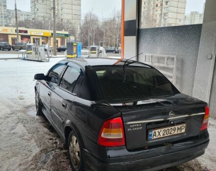 Черный Опель Астра, объемом двигателя 1.6 л и пробегом 254 тыс. км за 2400 $, фото 1 на Automoto.ua