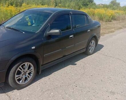Черный Опель Астра, объемом двигателя 1.4 л и пробегом 200 тыс. км за 3500 $, фото 6 на Automoto.ua