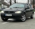Чорний Опель Астра, об'ємом двигуна 1.38 л та пробігом 320 тис. км за 2900 $, фото 1 на Automoto.ua