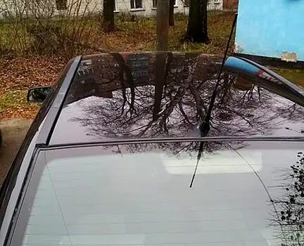 Черный Опель Астра, объемом двигателя 1.4 л и пробегом 155 тыс. км за 3500 $, фото 2 на Automoto.ua