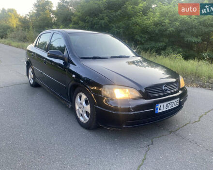 Черный Опель Астра, объемом двигателя 1.7 л и пробегом 300 тыс. км за 2400 $, фото 2 на Automoto.ua